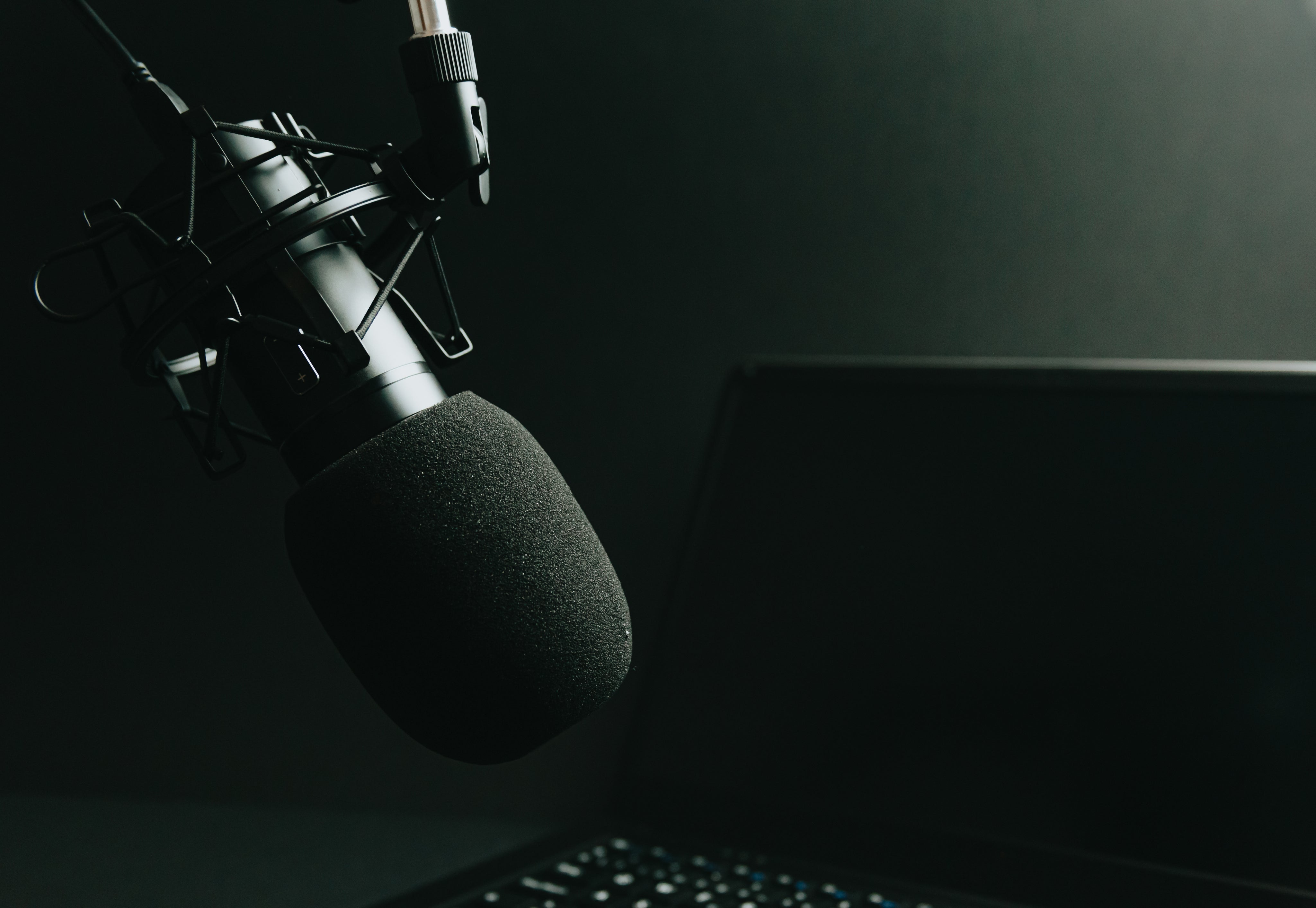 microphone-on-a-stand-and-laptop-in-monochrome.jpg